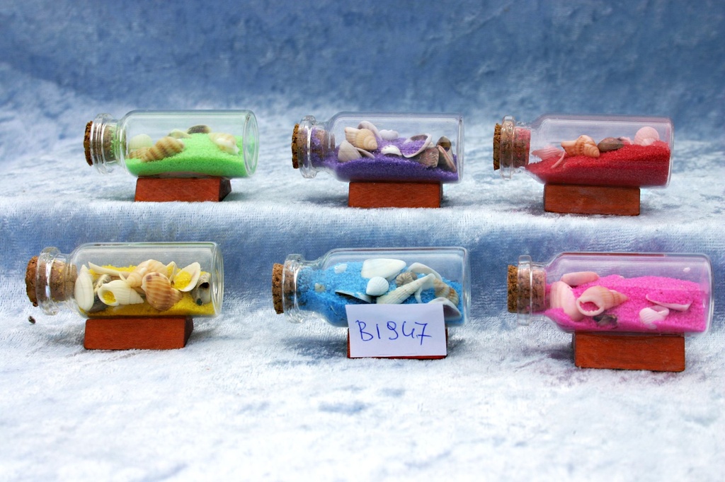 BOTTIGLIETTA VETRO C/SABBIA E CONCH C/BASE 6 COL 