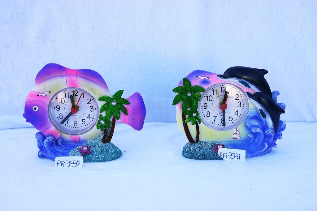 PESCI RESINA C/OROLOGIO 