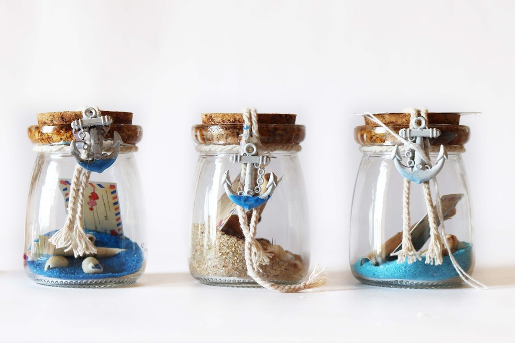 BOTTIGLIE VETRO C/SABBIA+CONCH 11CM 3 MOD 