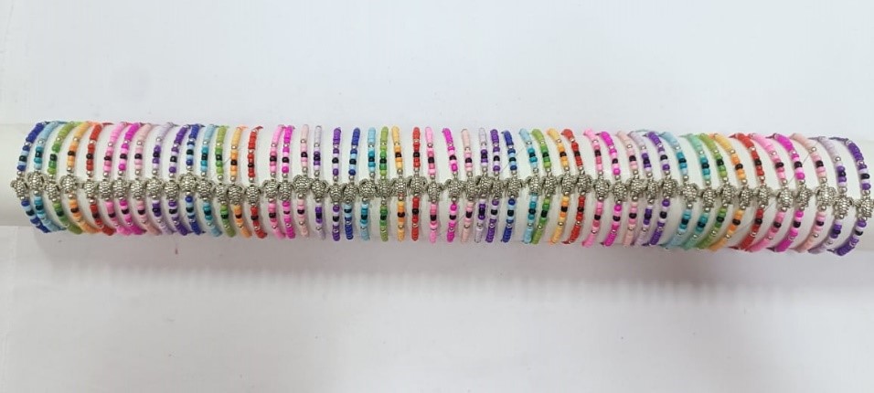 BRACCIALE PERLINE E METALLO SU TUBO