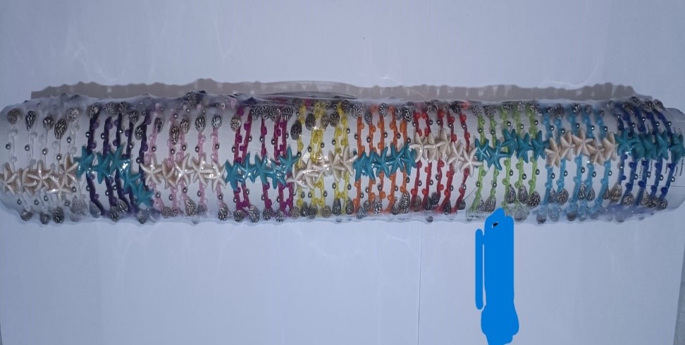 BRACCIALE CORDA, CONCHIGLIA E RESINA SU TUBO