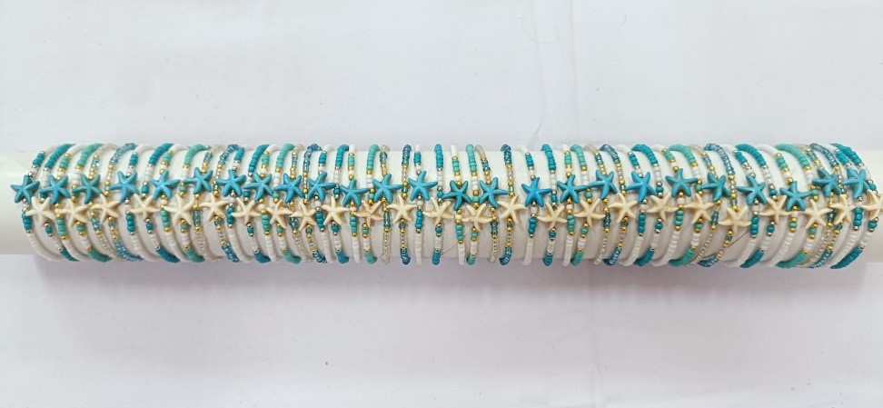 BRACCIALE PERLINE E RESINA SU TUO